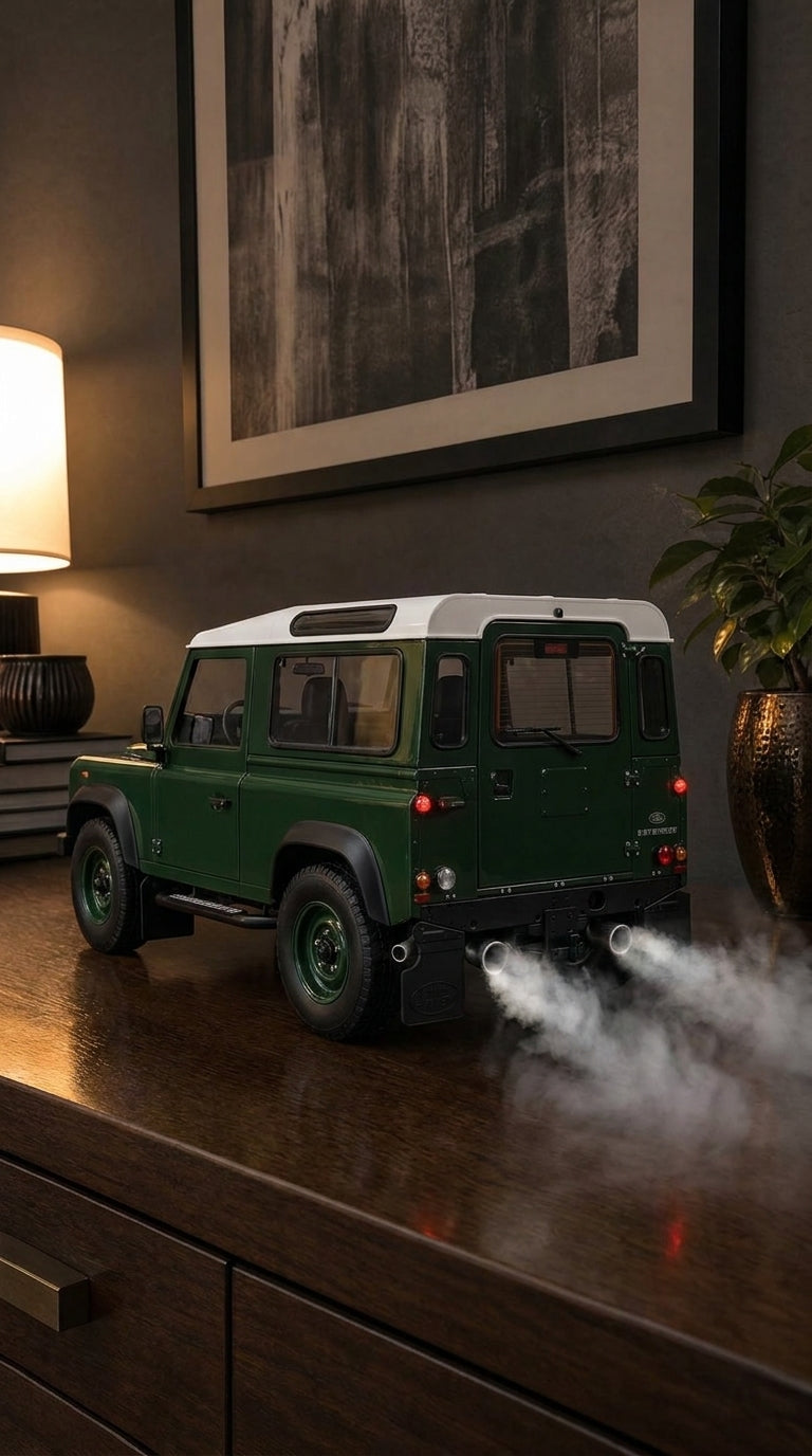 Green Land Rover Defender 90 model with white roof, steel wheels and mud flaps, smoke from twin exhausts