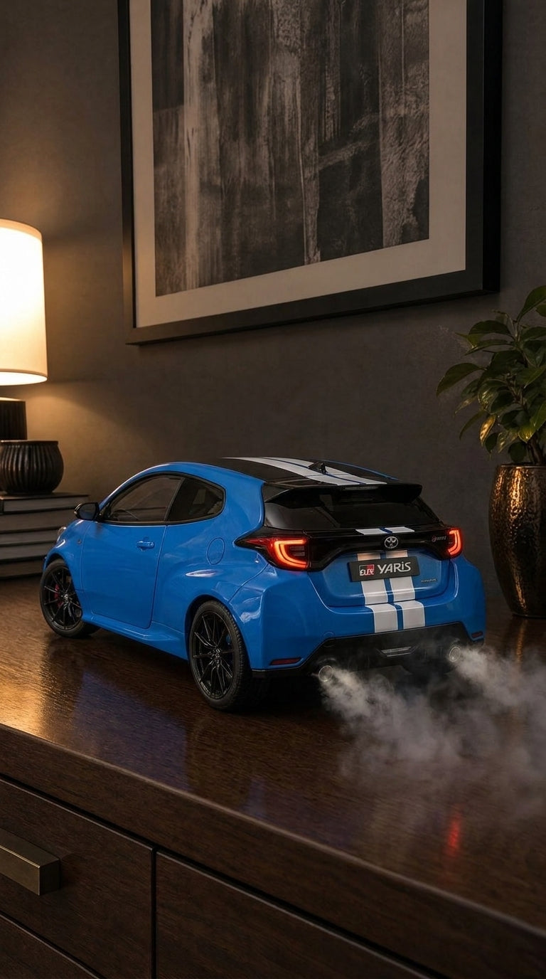 Blue Toyota GR Yaris model with black roof, white stripes and light bar glowing, smoke from twin exhausts