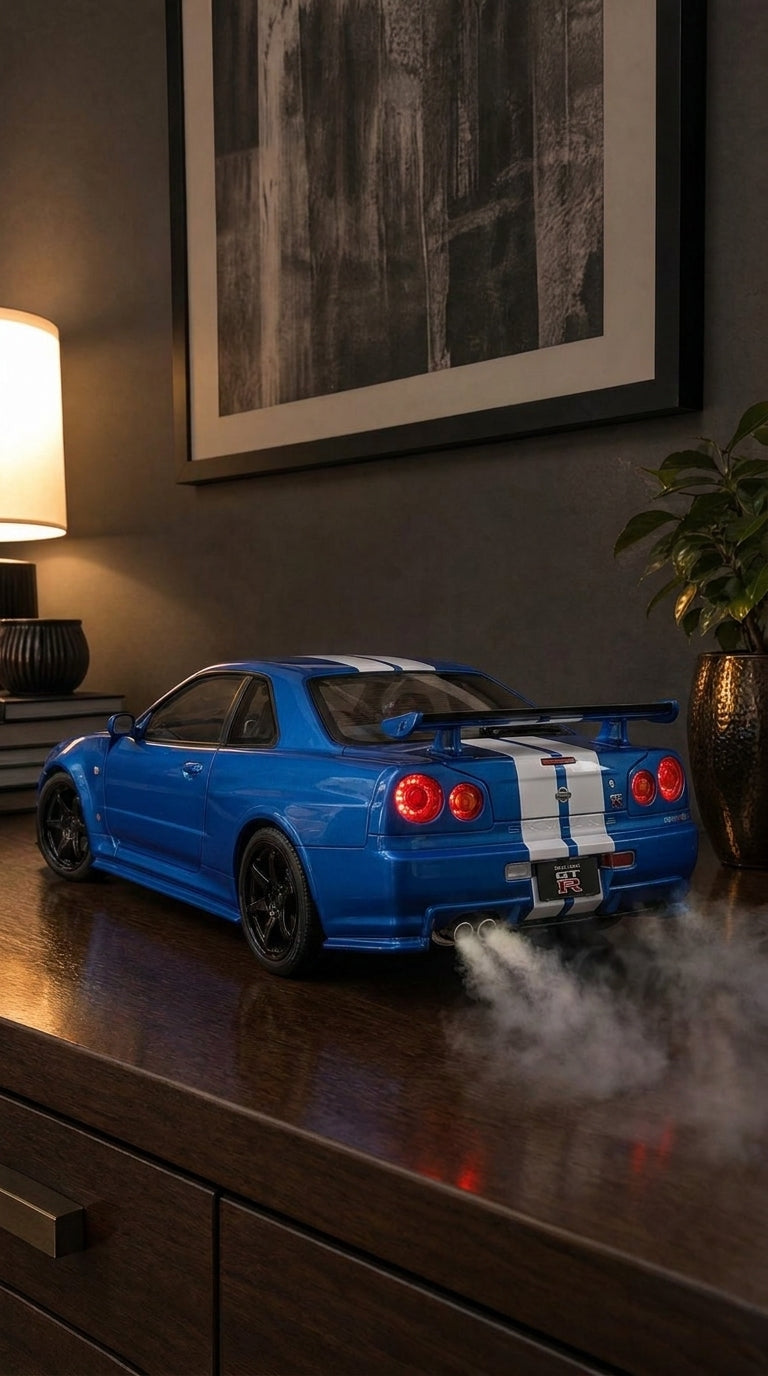 Blue Nissan Skyline GT-R R34 model with white stripes and rear wing, round tail lights on and smoke from twin exhausts