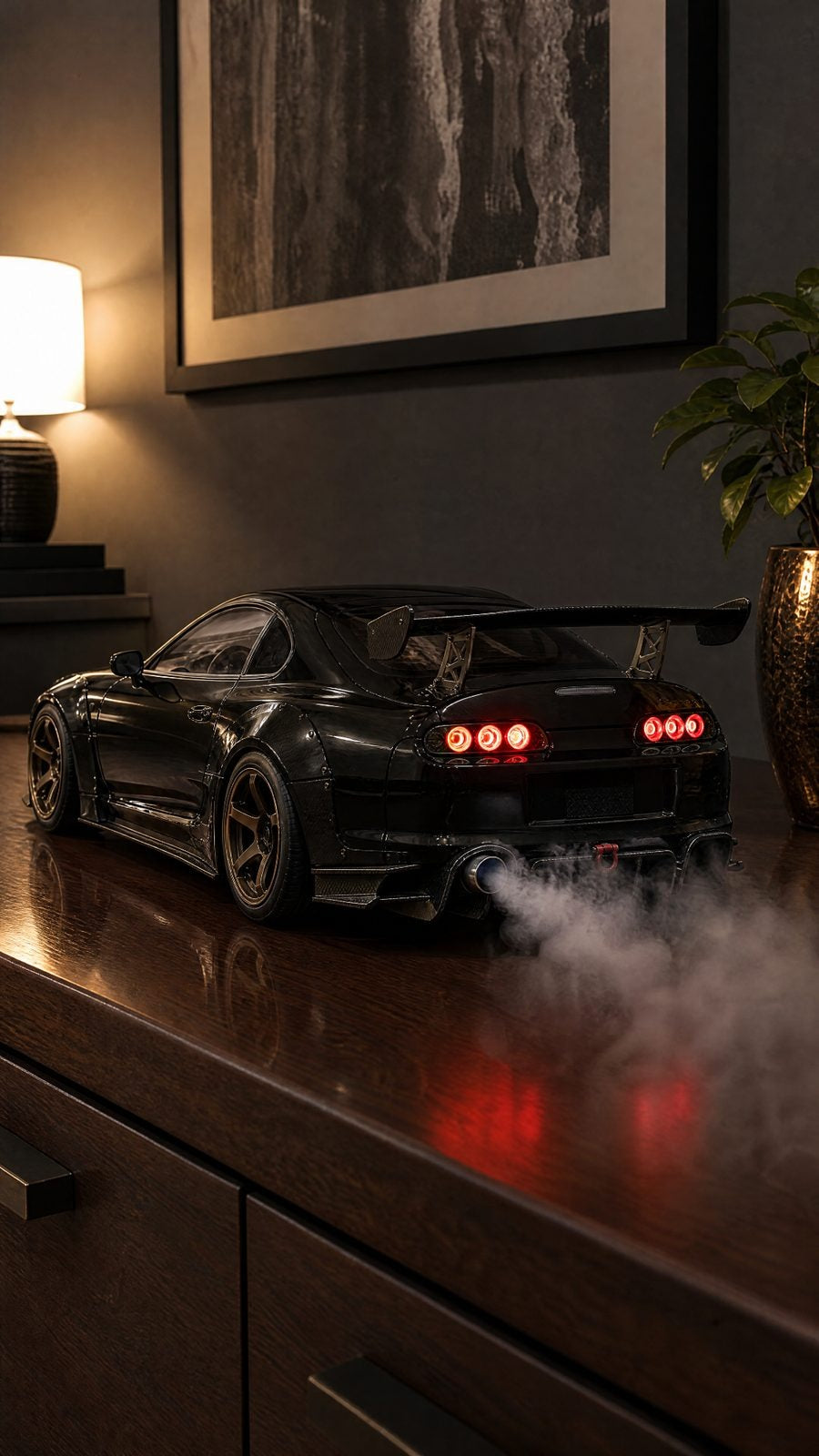 Black widebody Supra MK4 model with GT wing and bronze wheels, round tail lights on and smoke from the exhaust